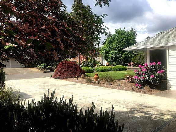 Lovely landscaped yard.