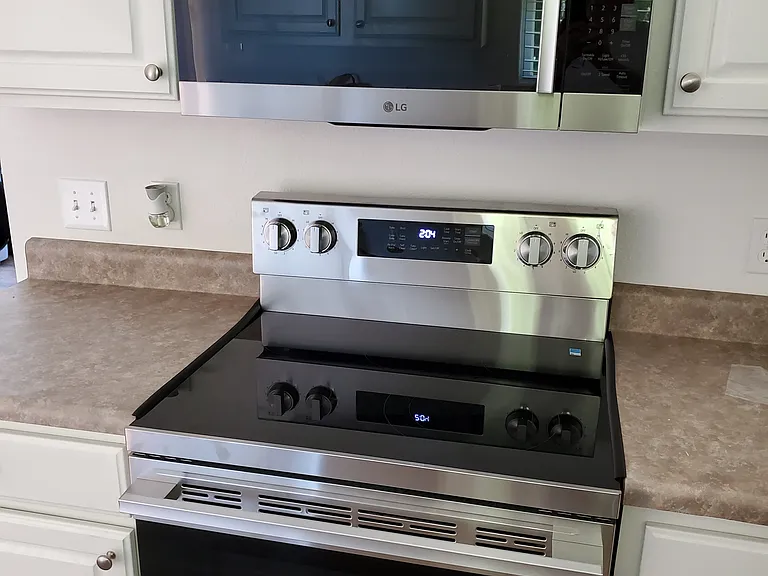 New Microwave & 5-Burner Range