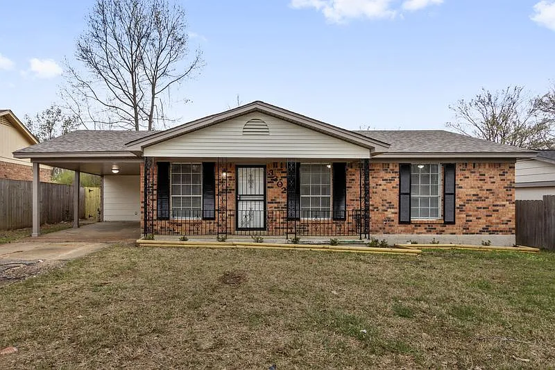 Charming Single-Story Brick Home with Cozy Layout & Fenced Backyard — Photo 1
