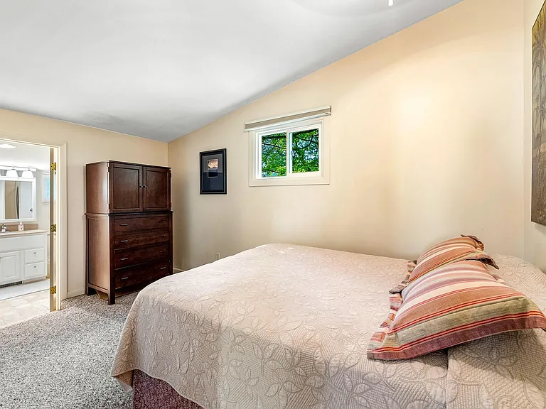 2nd bedroom, opening into large 2nd bathroom and closet