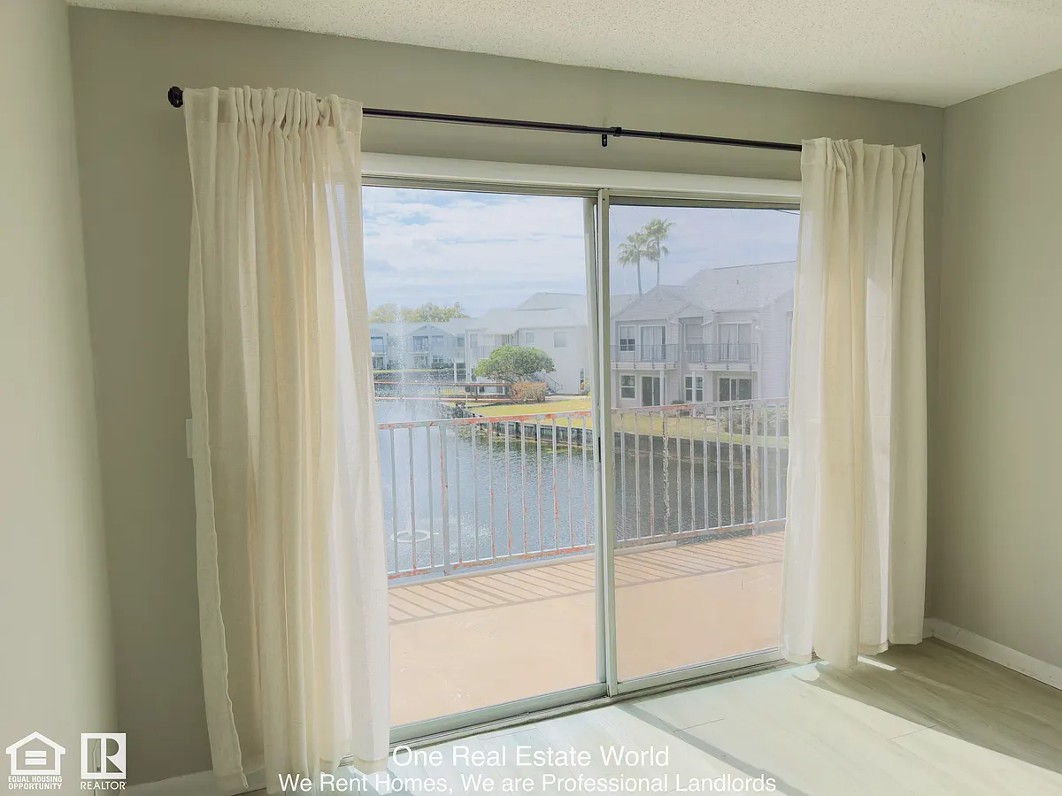 Building Photo - 2504 Woodgate Blvd #204