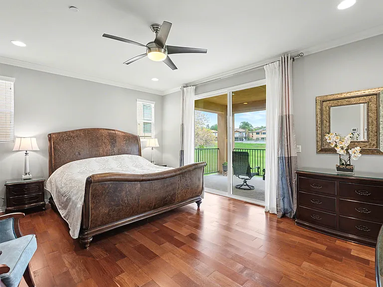 Master bedroom with covered balcony