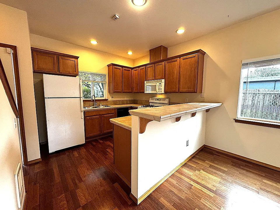 Kitchen with bar style countertop