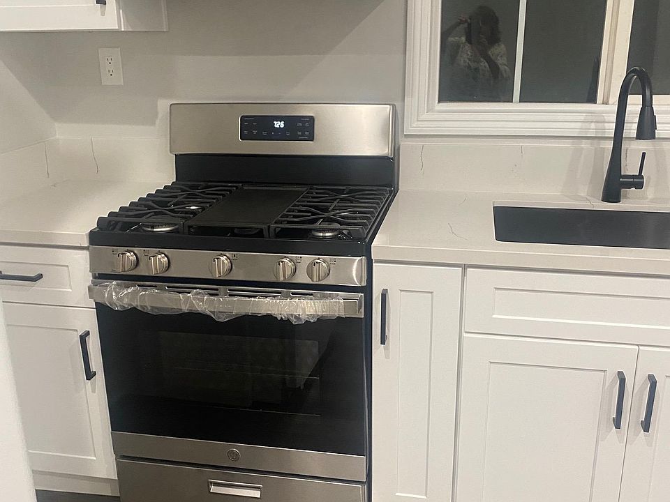 New GE Stainless Steel Self cleaning Oven and New GE Microwave
