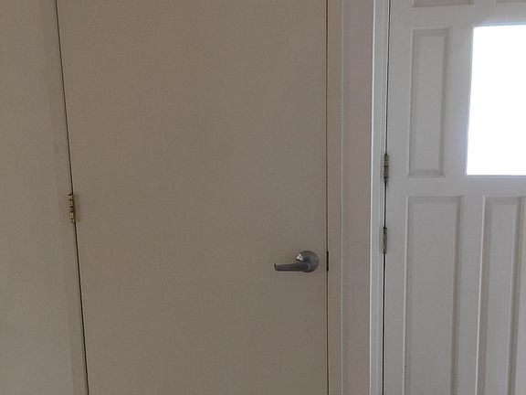 Entry, coat closet and front door.