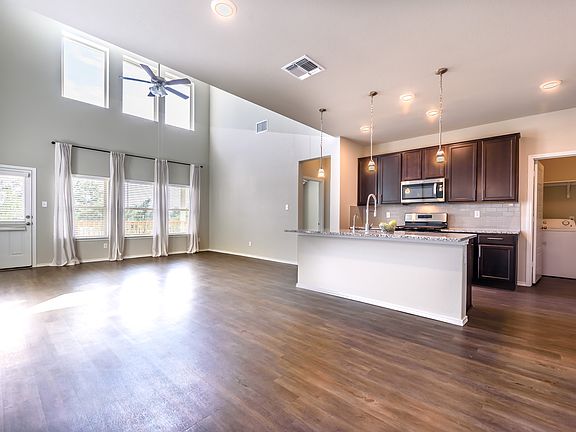 Open kitchen with combo living and dining areas--lots of natural light,