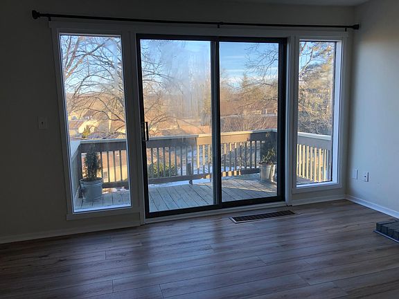 Delightful deck over looking mature landscaping and well maintained grounds.