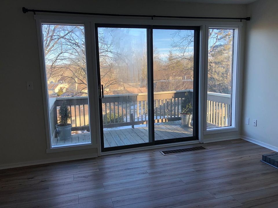 Delightful deck over looking mature landscaping and well maintained grounds.