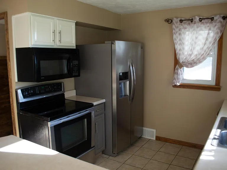 Kitchen with stainless appliances.
