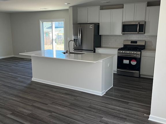 Open concept with modern state of the art appliances and granite counter tops.