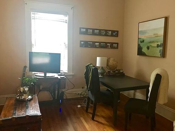 Livingroom is large enough to also be a home office, or set up the entry way with a desk and work from home there.