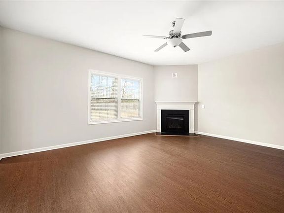 Living room with corner gas fireplace