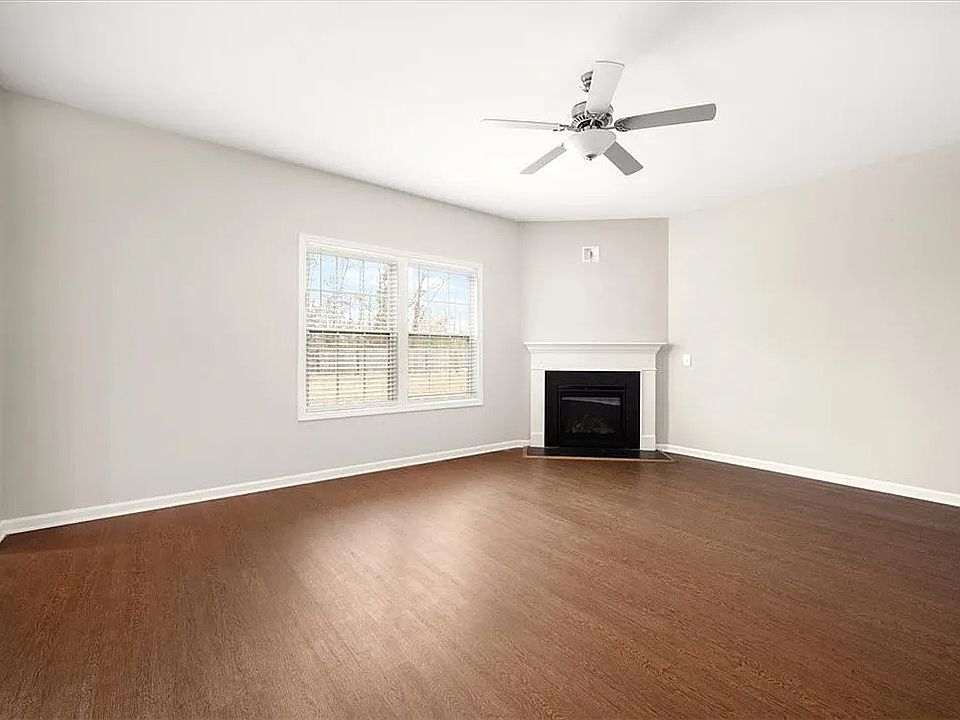 Living room with corner gas fireplace