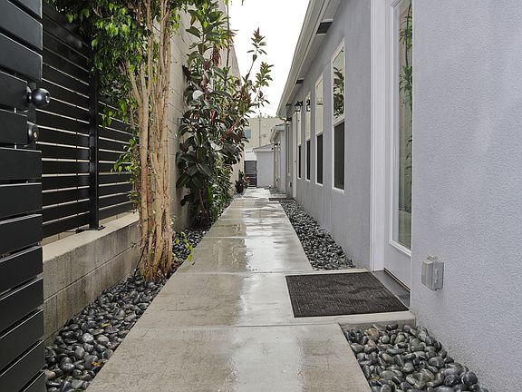 Unit A Front Door, Walkway to Garage