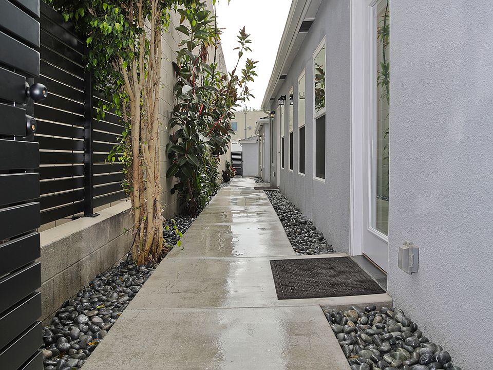 Unit A Front Door, Walkway to Garage