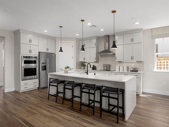 Spacious kitchen with large center island perfect for entertaining