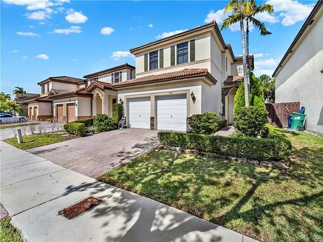 9243 SW 227th Ter — Photo 1