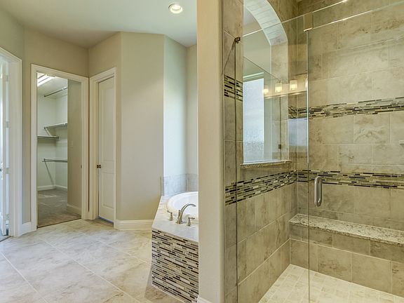 Oversized shower with seat