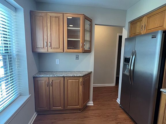 Plenty of cabinets! Recessed lights and large window.