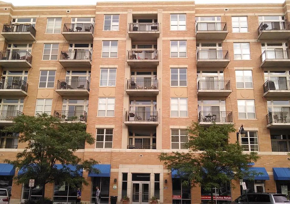 Front of building. Canopy of building is now black