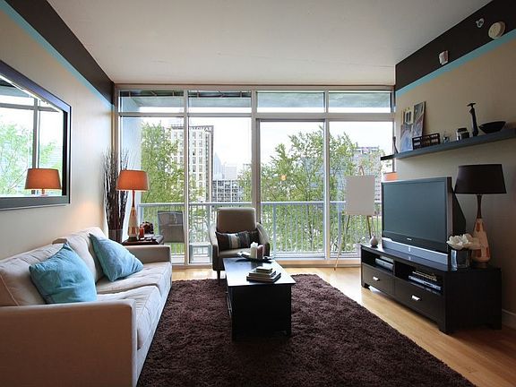 Living room is large enough to comfortably host movie night or the big game.