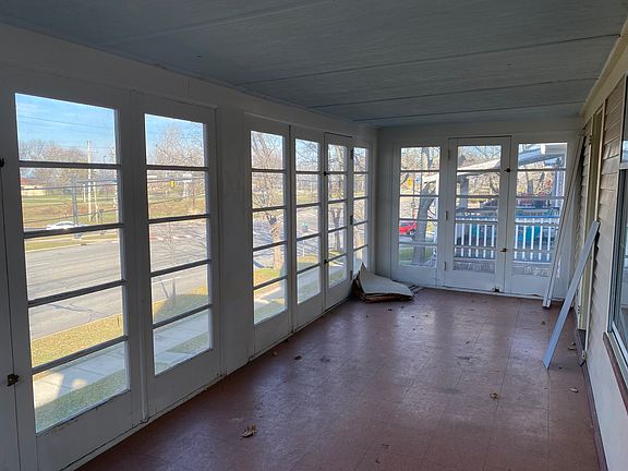 Enclosed front porch overlooking Edgewater Park