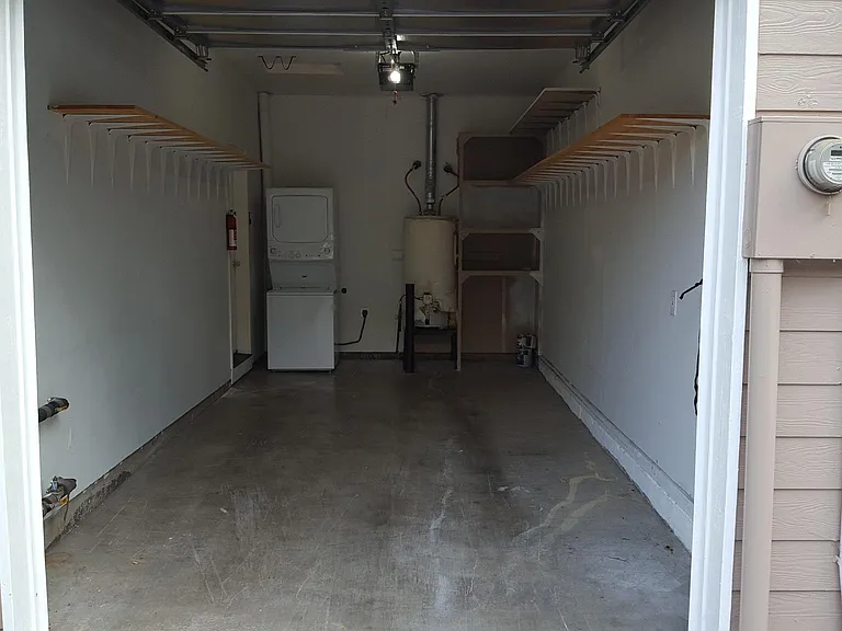 Garage with included washer and dryer.