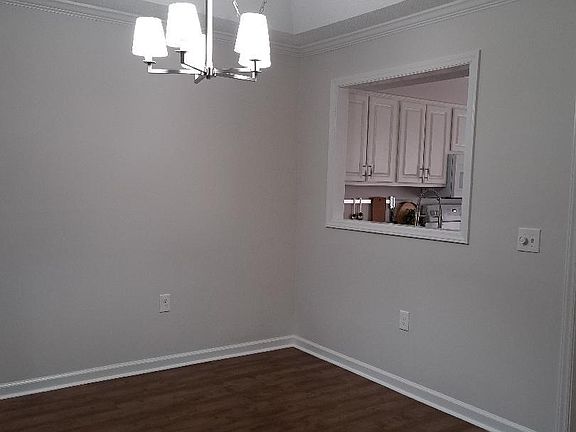 dining area with kitchen pass thru