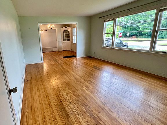 Family room looking into dining room and bonus room