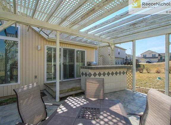 Entertain or enjoy quiet times on your back tiled patio with bar