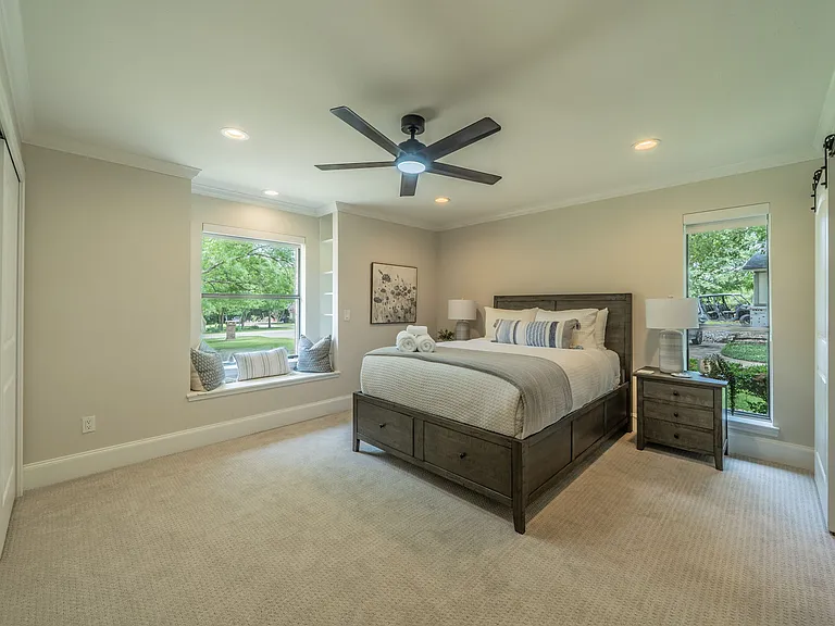Serene Guest Suite: Window Seat, Garden Views & Modern Black Accents