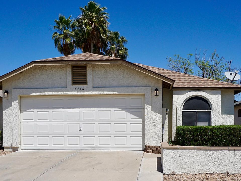 Front of Home - front porch and picturesque window into kitchen