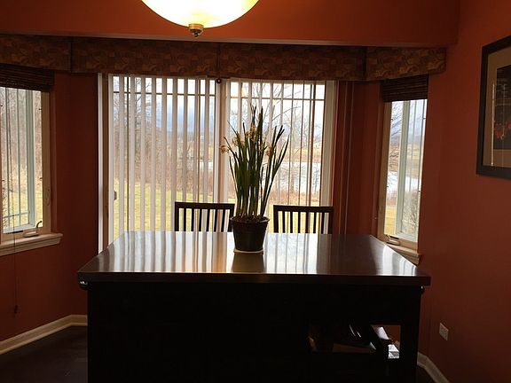 Kitchen eating area with lake view
