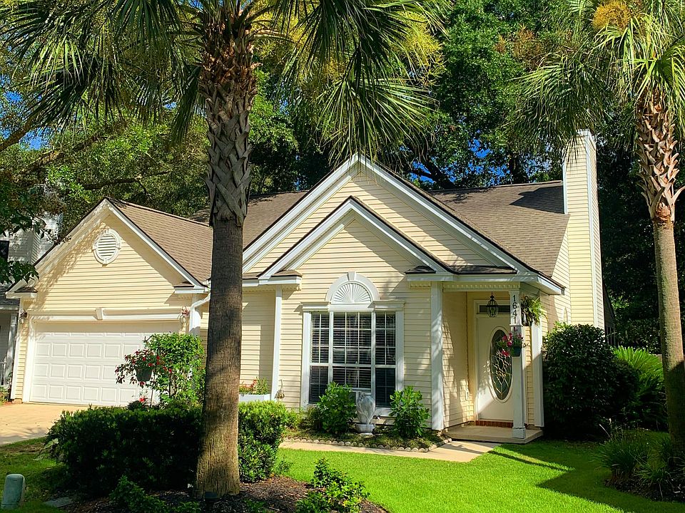Beautiful palm trees in front of the house