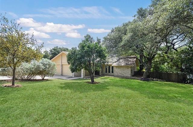 Welcome home to 7223 Scenic Brook Drive