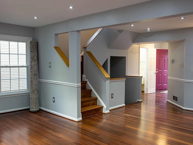 Stairs from the main level to the basement and upstairs.
