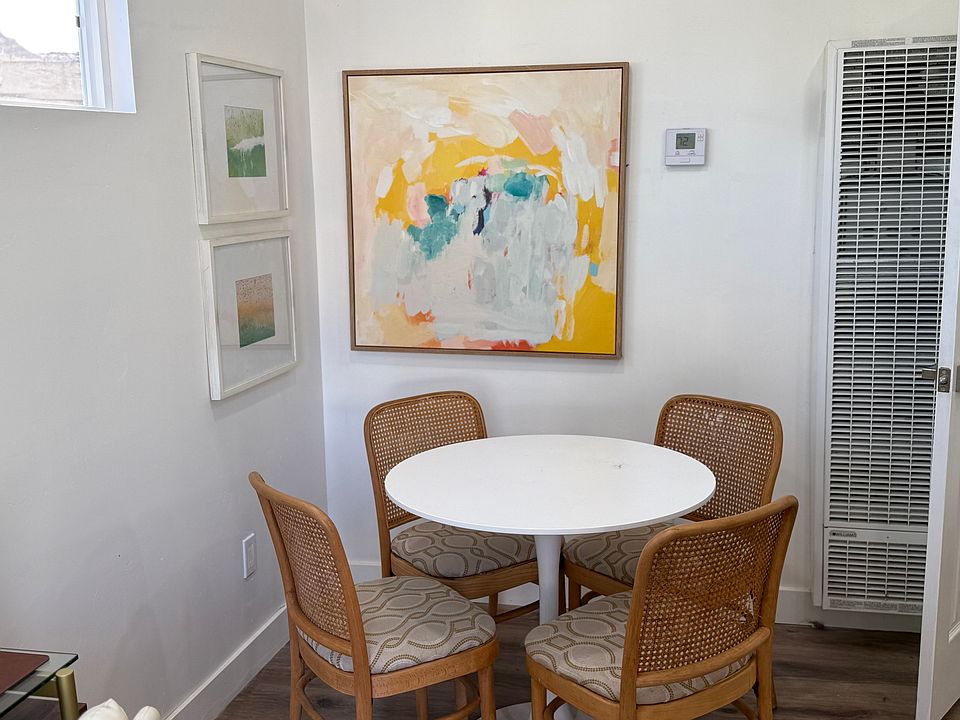 Dining area for 4 comfortably and 5 if you're really good friends