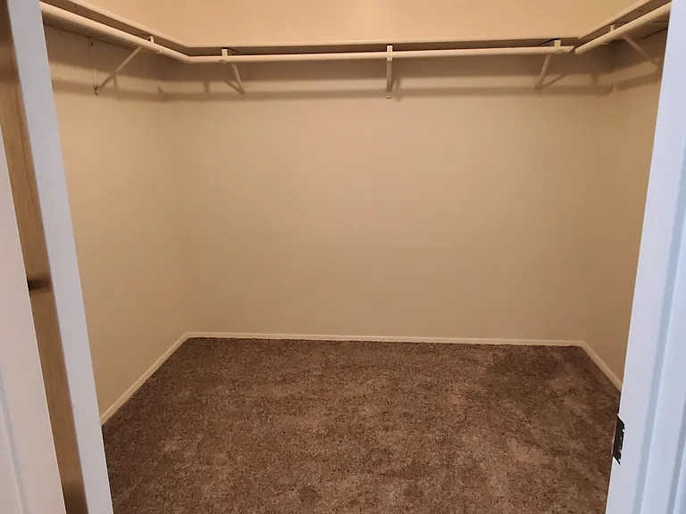 Primary bedroom suite walk-in closet
