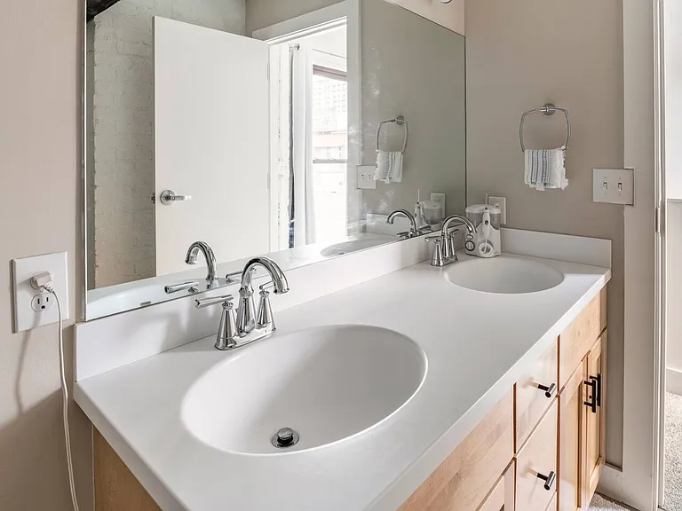 Second floor full bathroom with double sinks