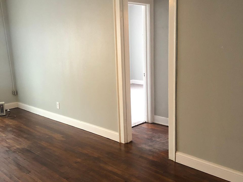 Reclaimed hardwood floors run through the halways.