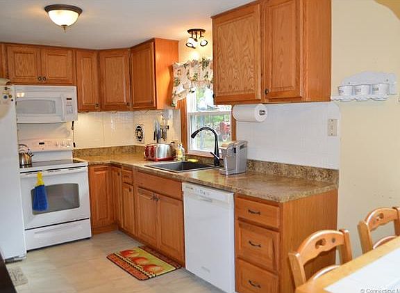 Remodeled kitchen with dini...
