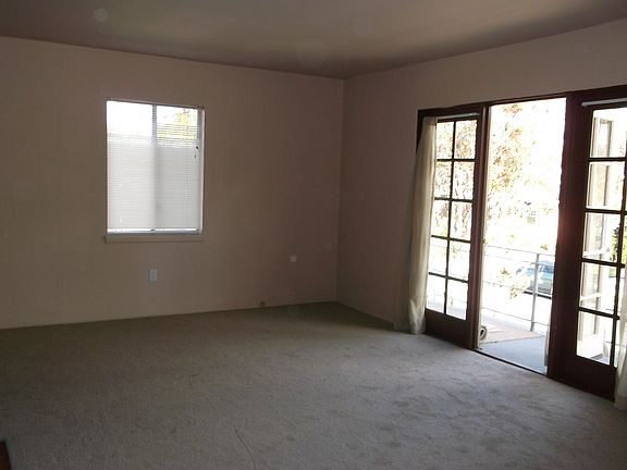 French doors lead to balcony