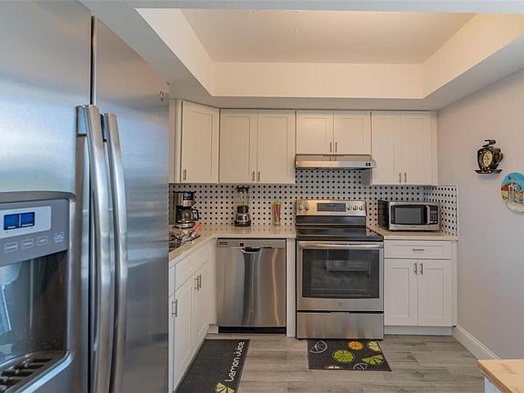 3rd image of 2621 Cove Cay Dr Unit 408