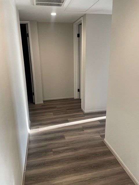 Hallway to bedrooms and guest bath.