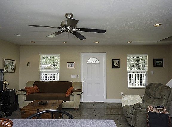 Stained scored concrete flooring
