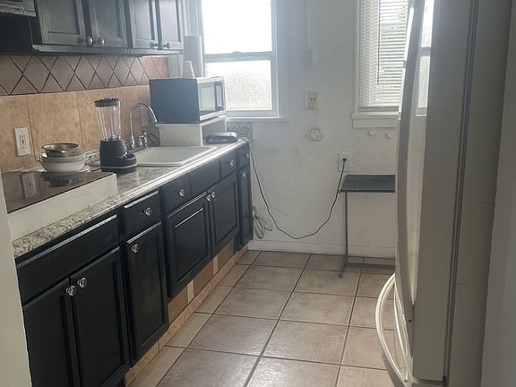 3rd image of 122 NE 3rd Ave