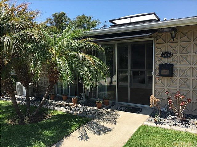 Entry to this delightful LW home.  Note the palm tree.