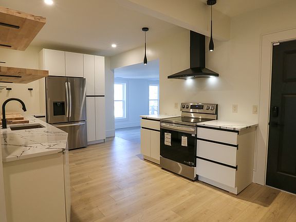 Kitchen opens to the large living room space