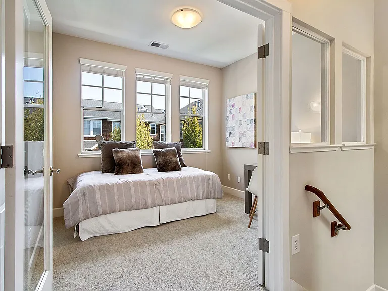 (top floor) bedroom 2. Photos are from when the property was previously staged