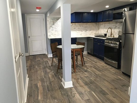 Glo BBC Al view of Kitchen and Hallway